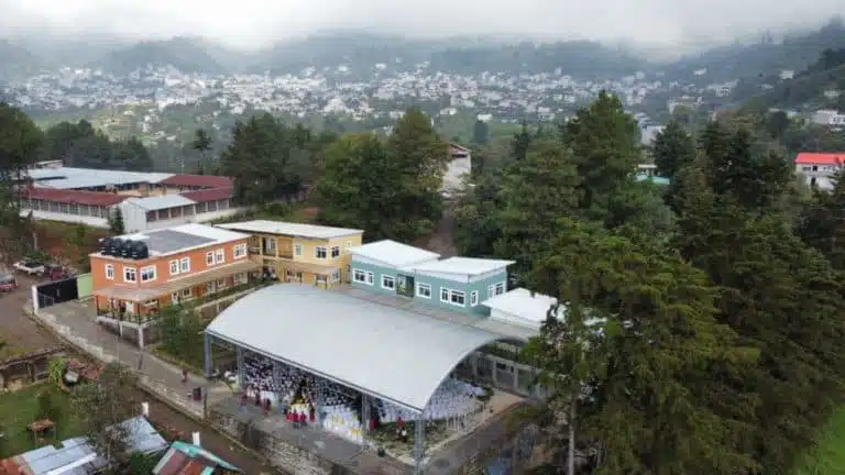 Limitless Horizons Ixil educational campus in a lush, mountainous region of Guatemala.