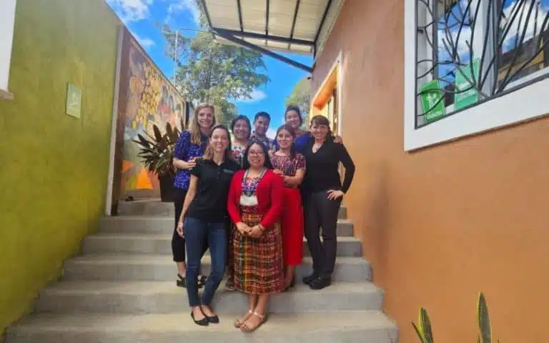 Group of women and staff at Limitless Horizons Ixil in Guatemala, fostering community development.